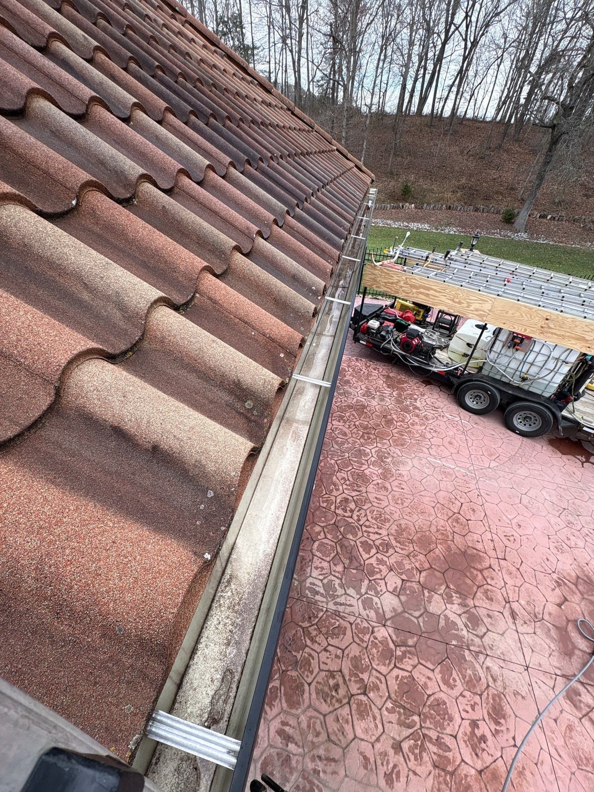 Exterior gutter cleaning and residential window washing services