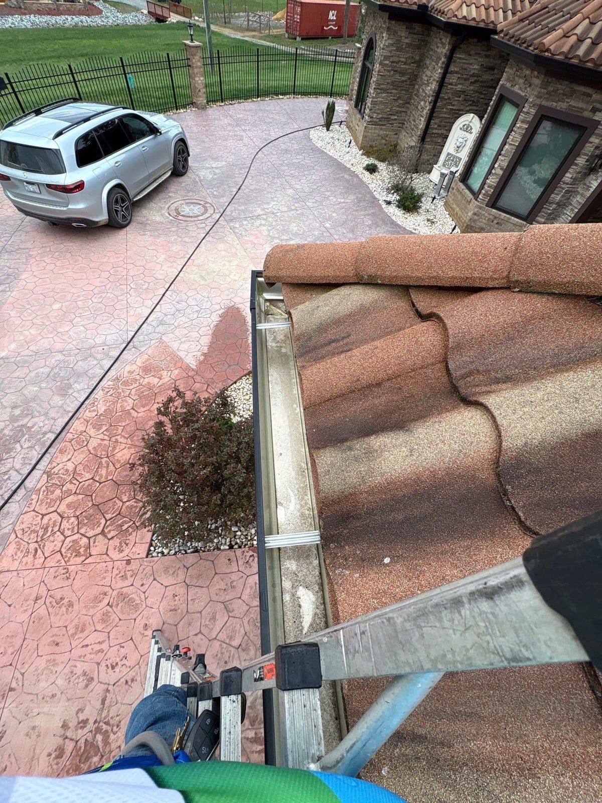 Exterior gutter cleaning and residential window washing services