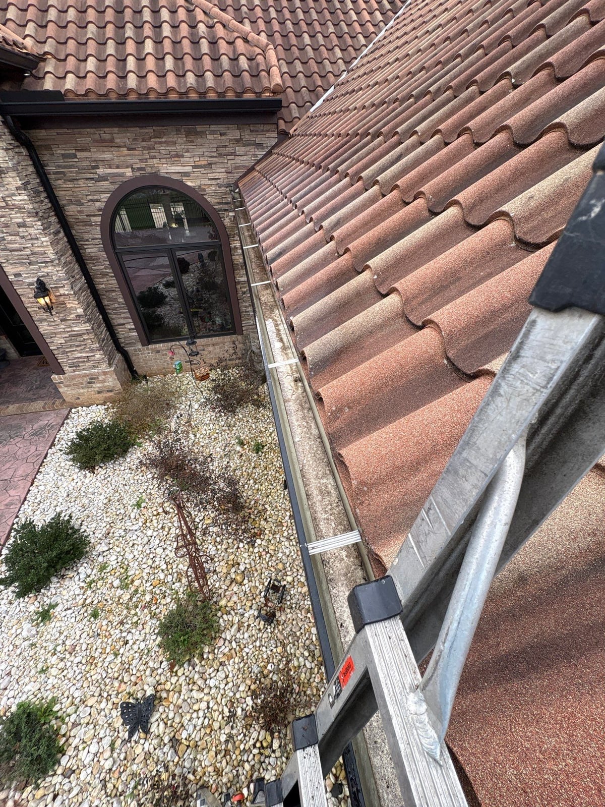 Exterior gutter cleaning and residential window washing services