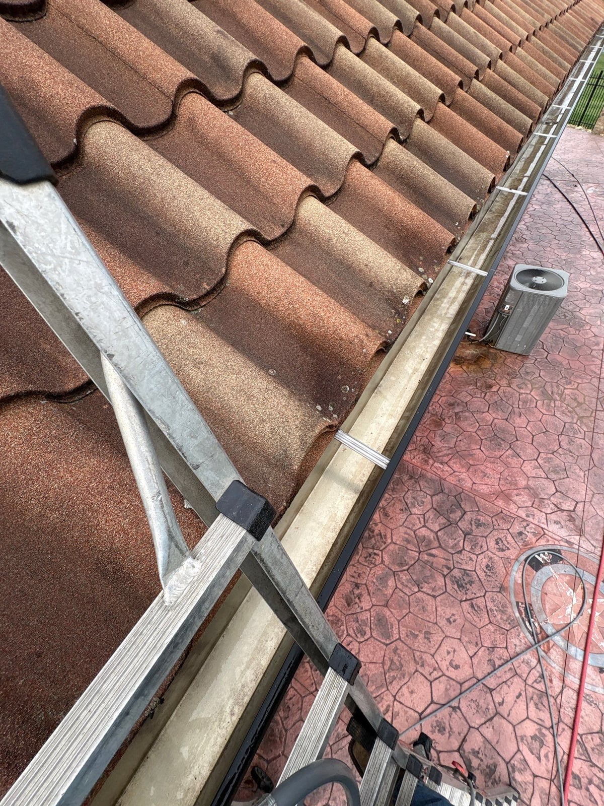 Exterior gutter cleaning and residential window washing services