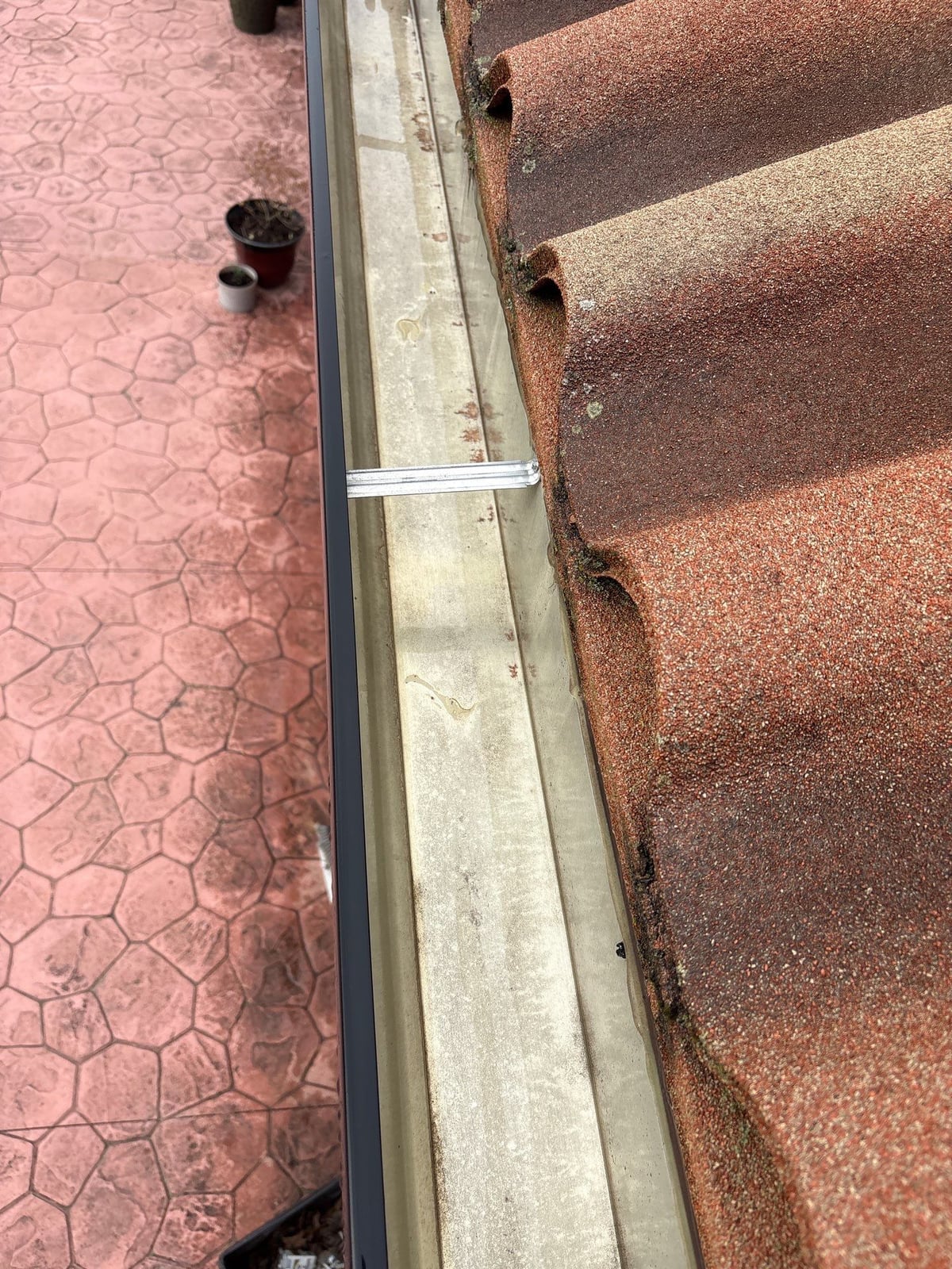 Exterior gutter cleaning and residential window washing services