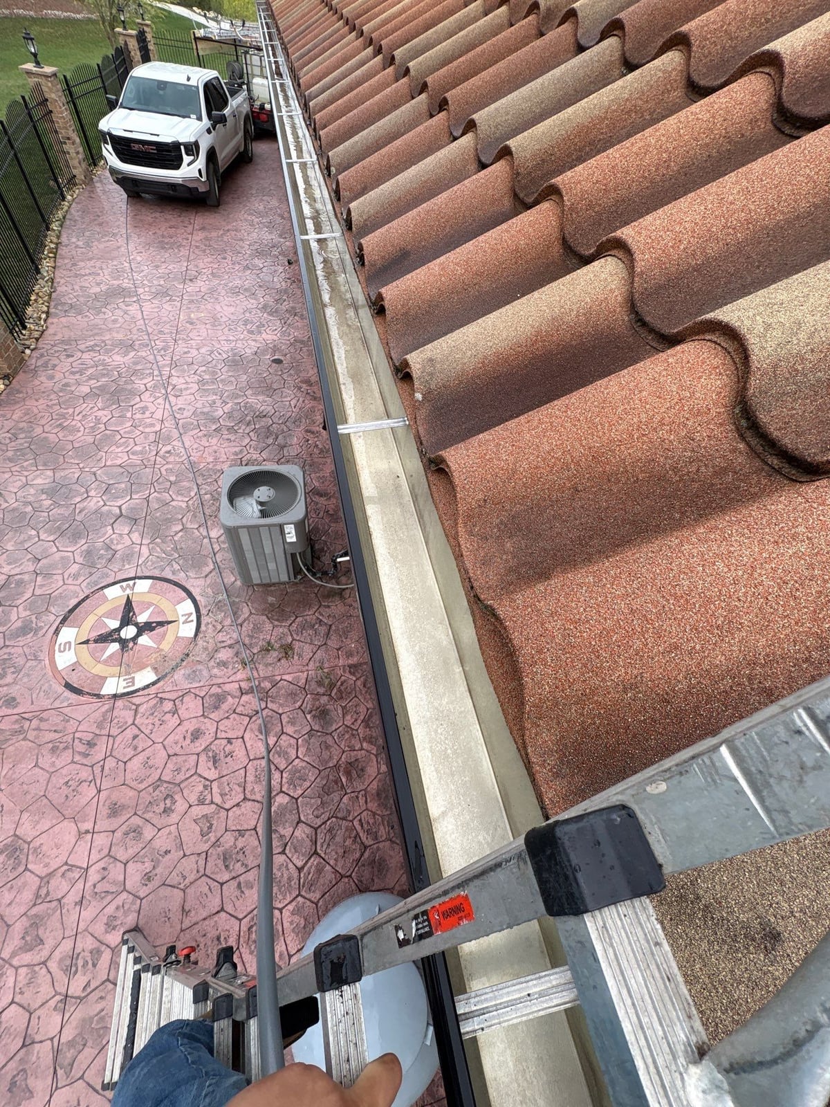 Exterior gutter cleaning and residential window washing services