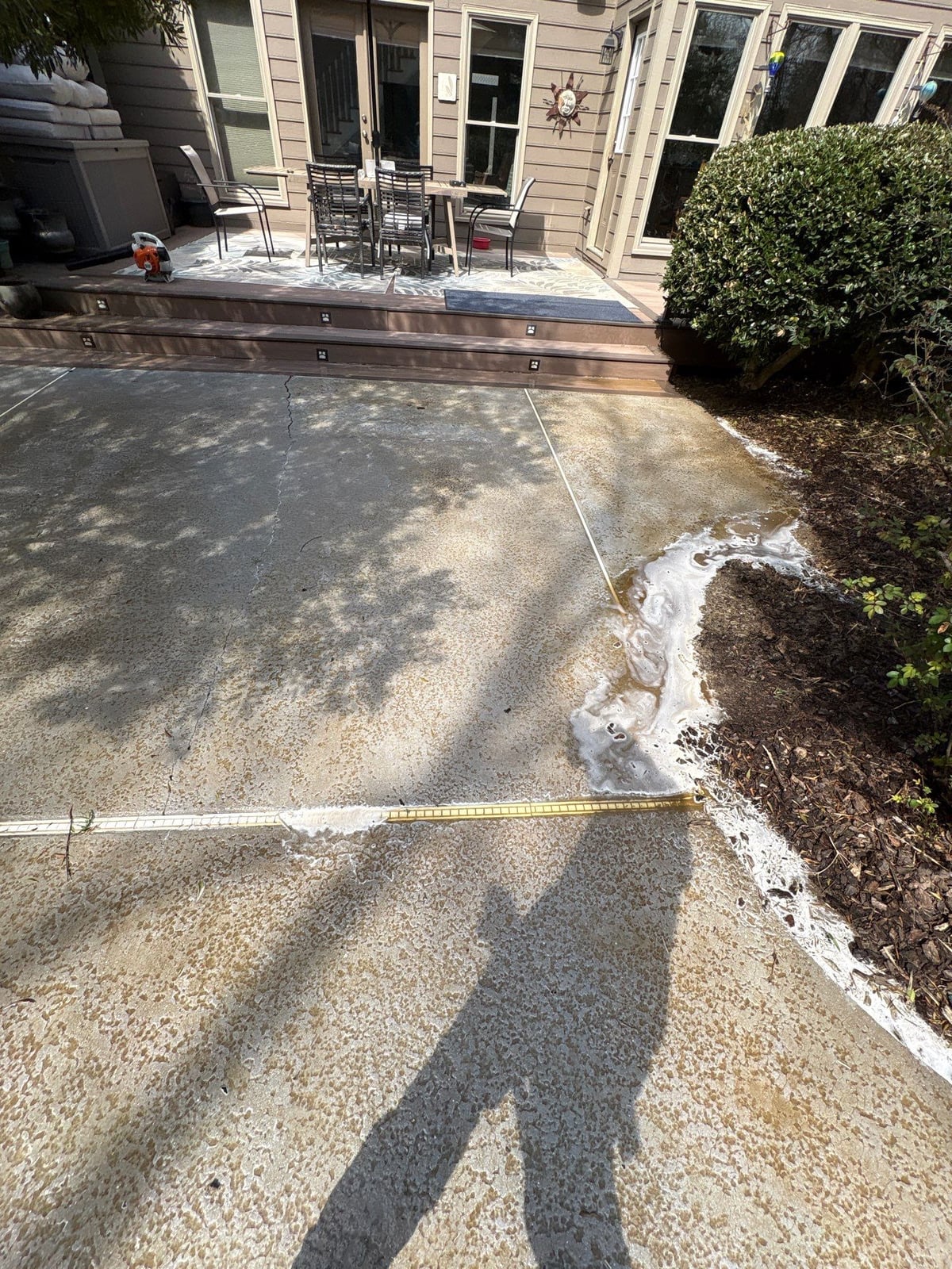 Soft washing and cleaning of residential pool deck surface