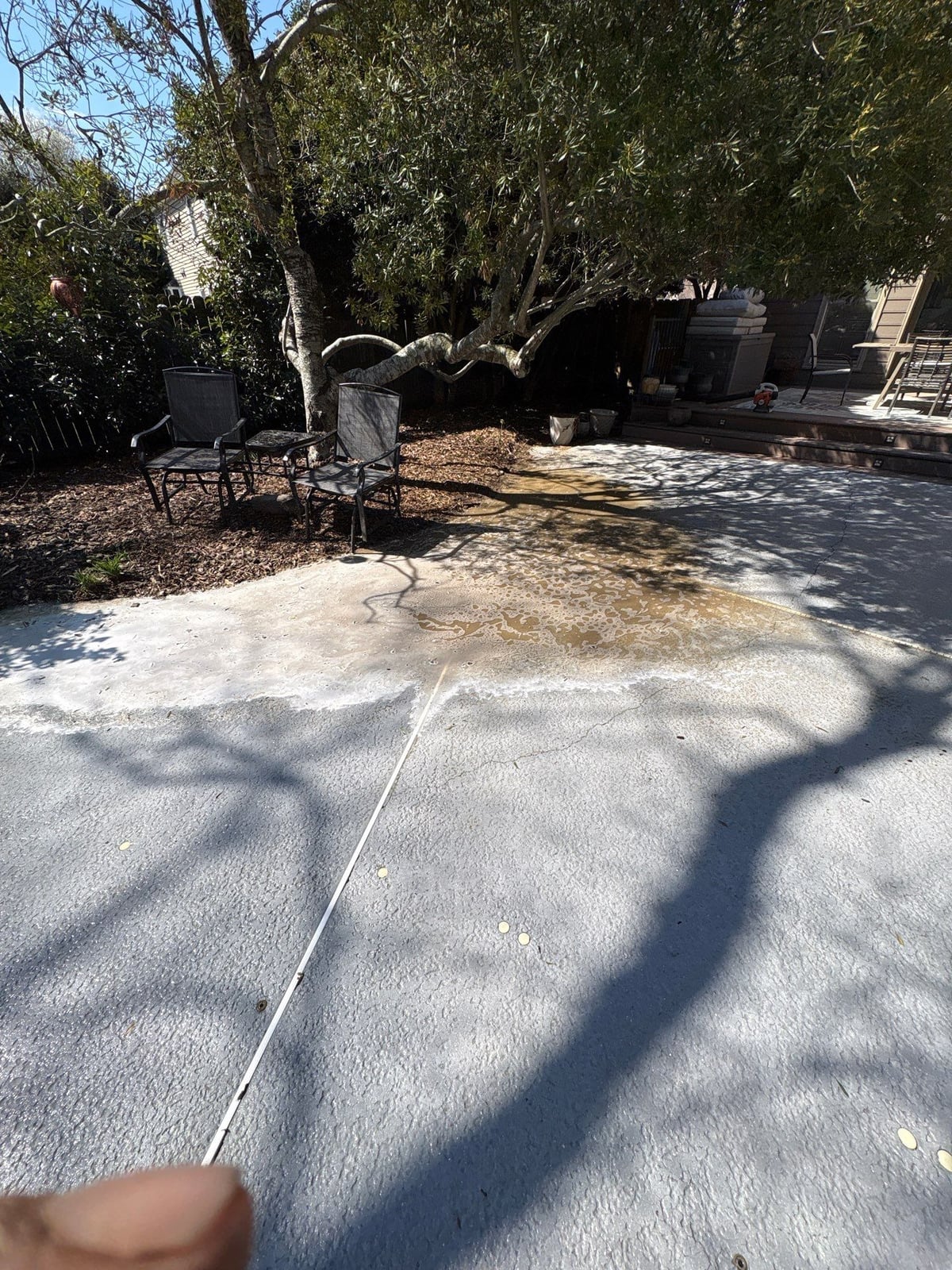 Soft washing and cleaning of residential pool deck surface