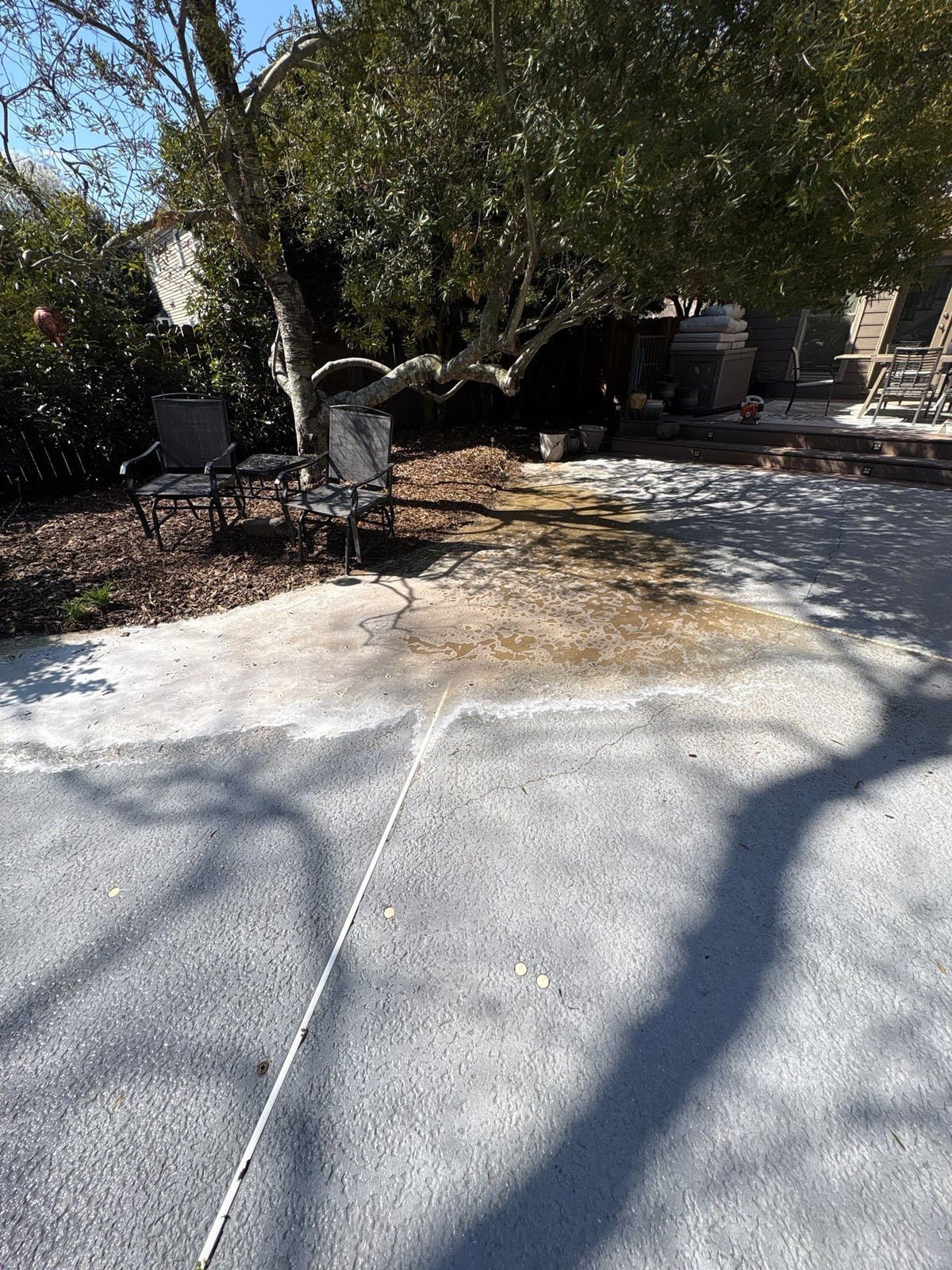 Soft washing and cleaning of residential pool deck surface