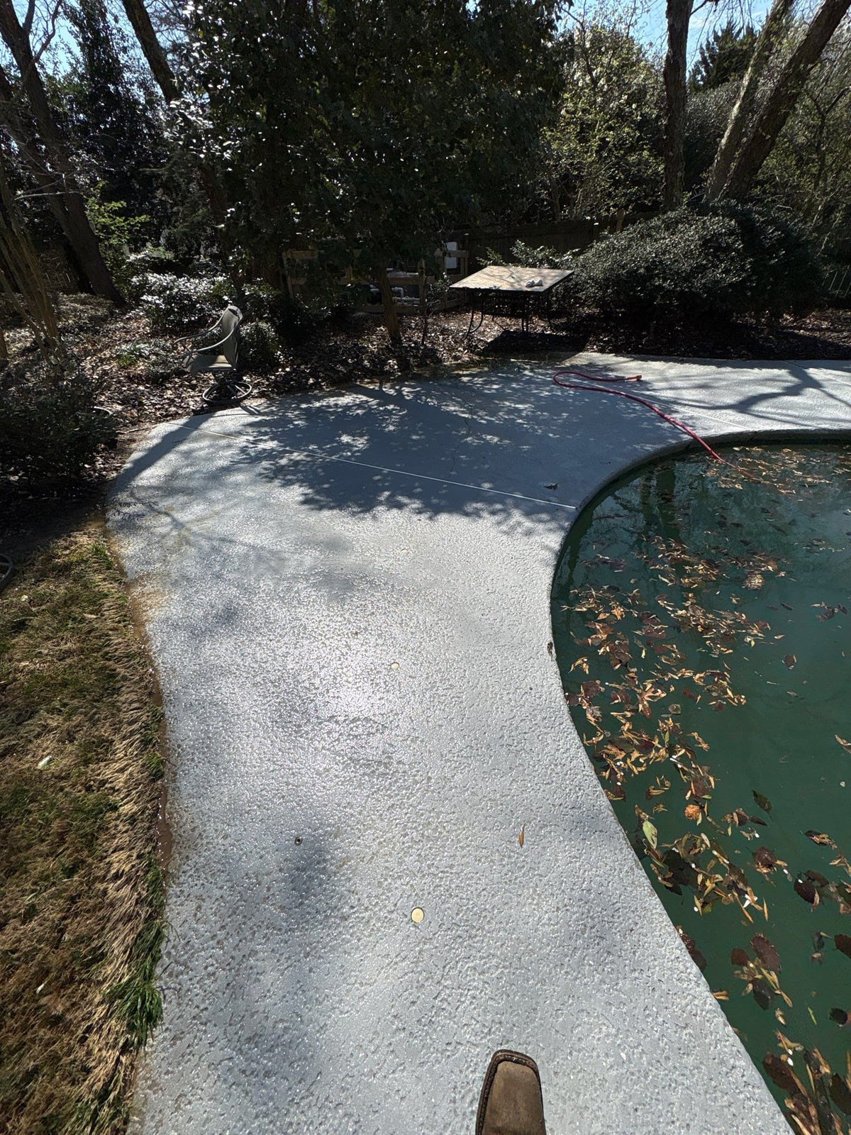Soft washing and cleaning of residential pool deck surface