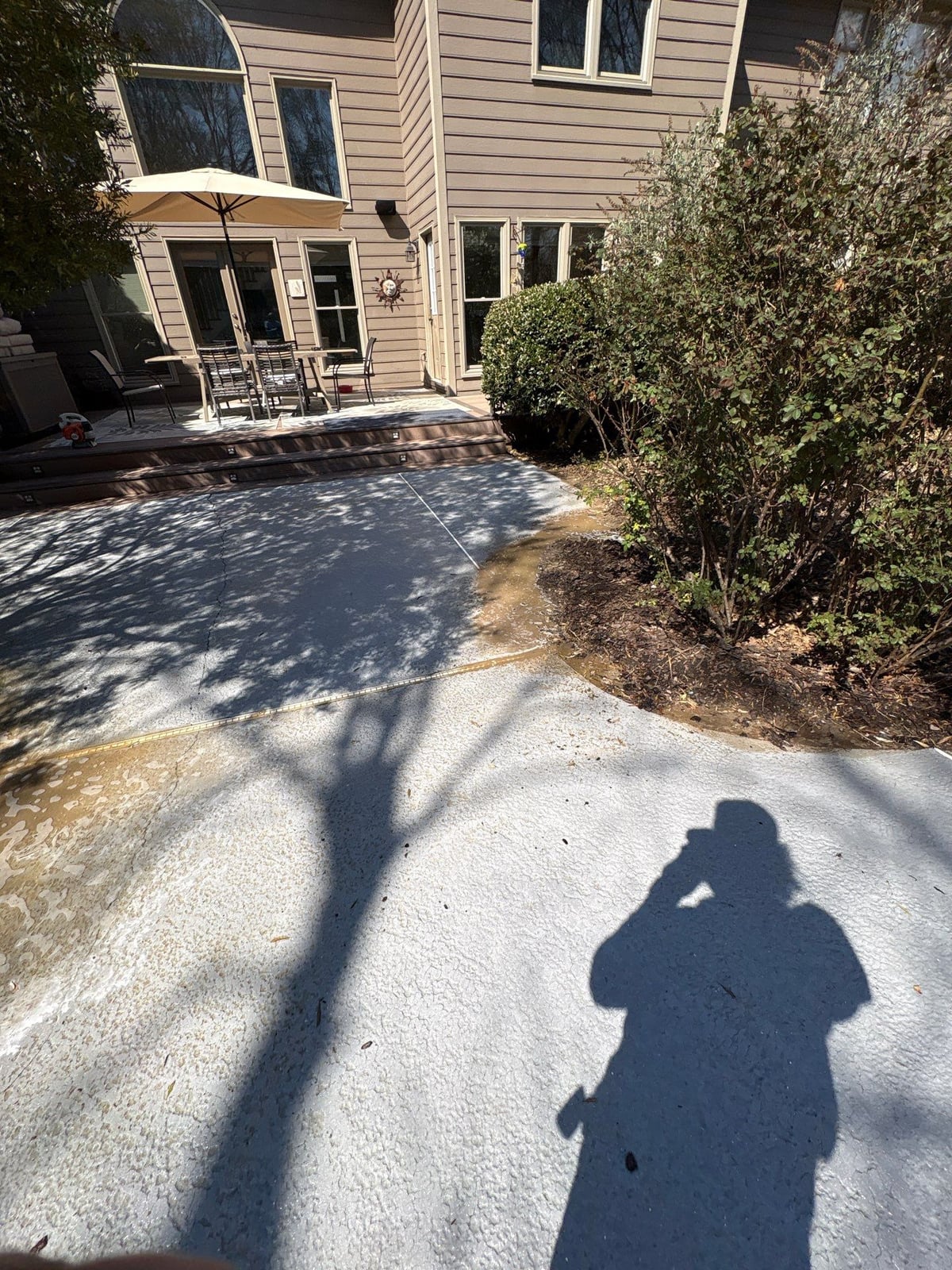 Soft washing and cleaning of residential pool deck surface