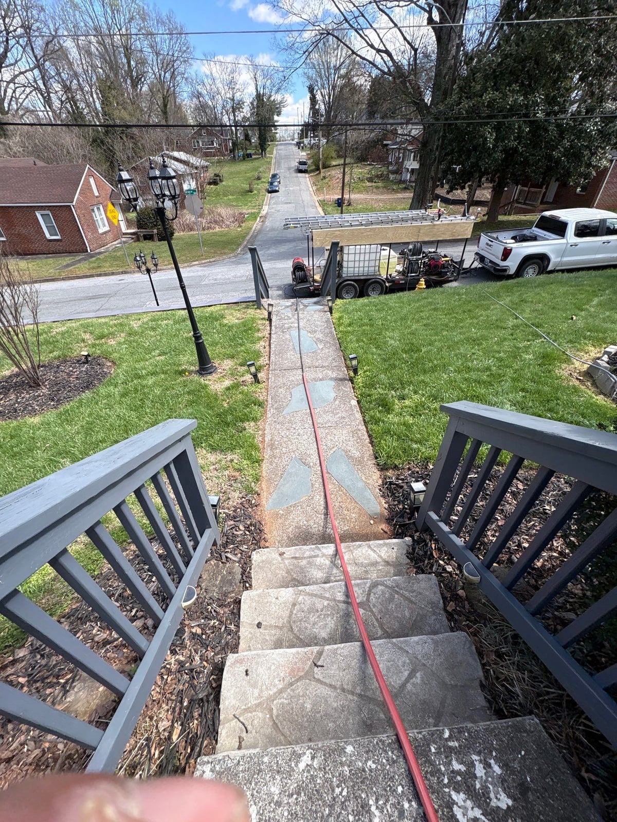 House washing and pressure washing front walkway and fence