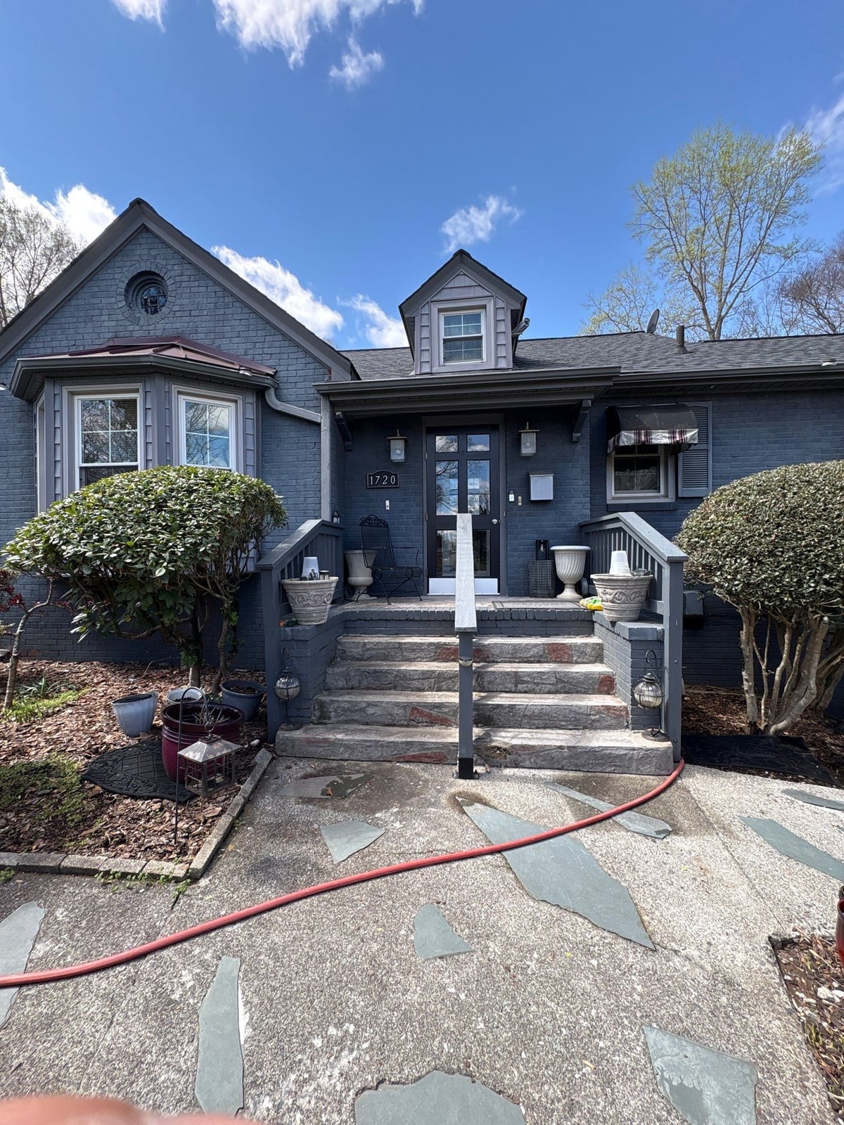 House washing and pressure washing front walkway and fence