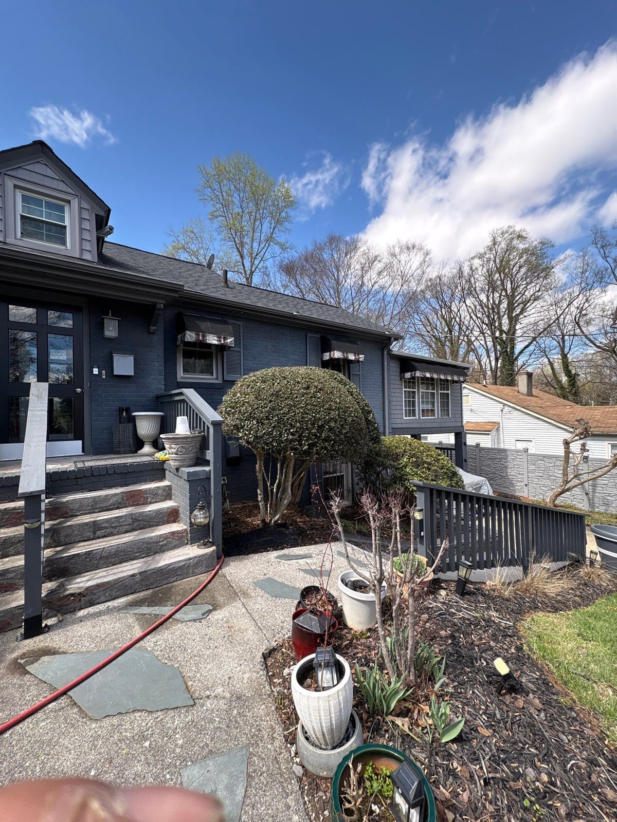 House washing and pressure washing front walkway and fence