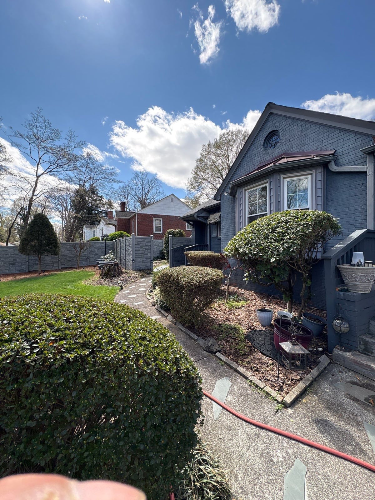 House washing and pressure washing front walkway and fence