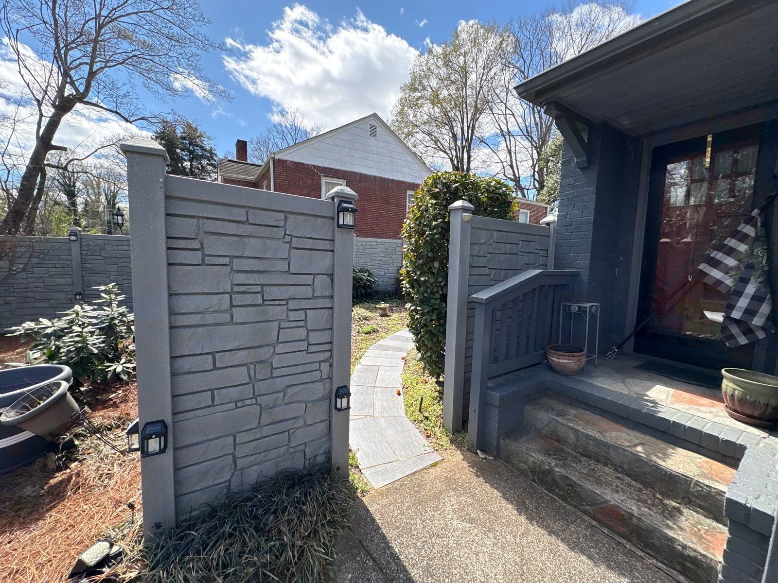 House washing and pressure washing front walkway and fence