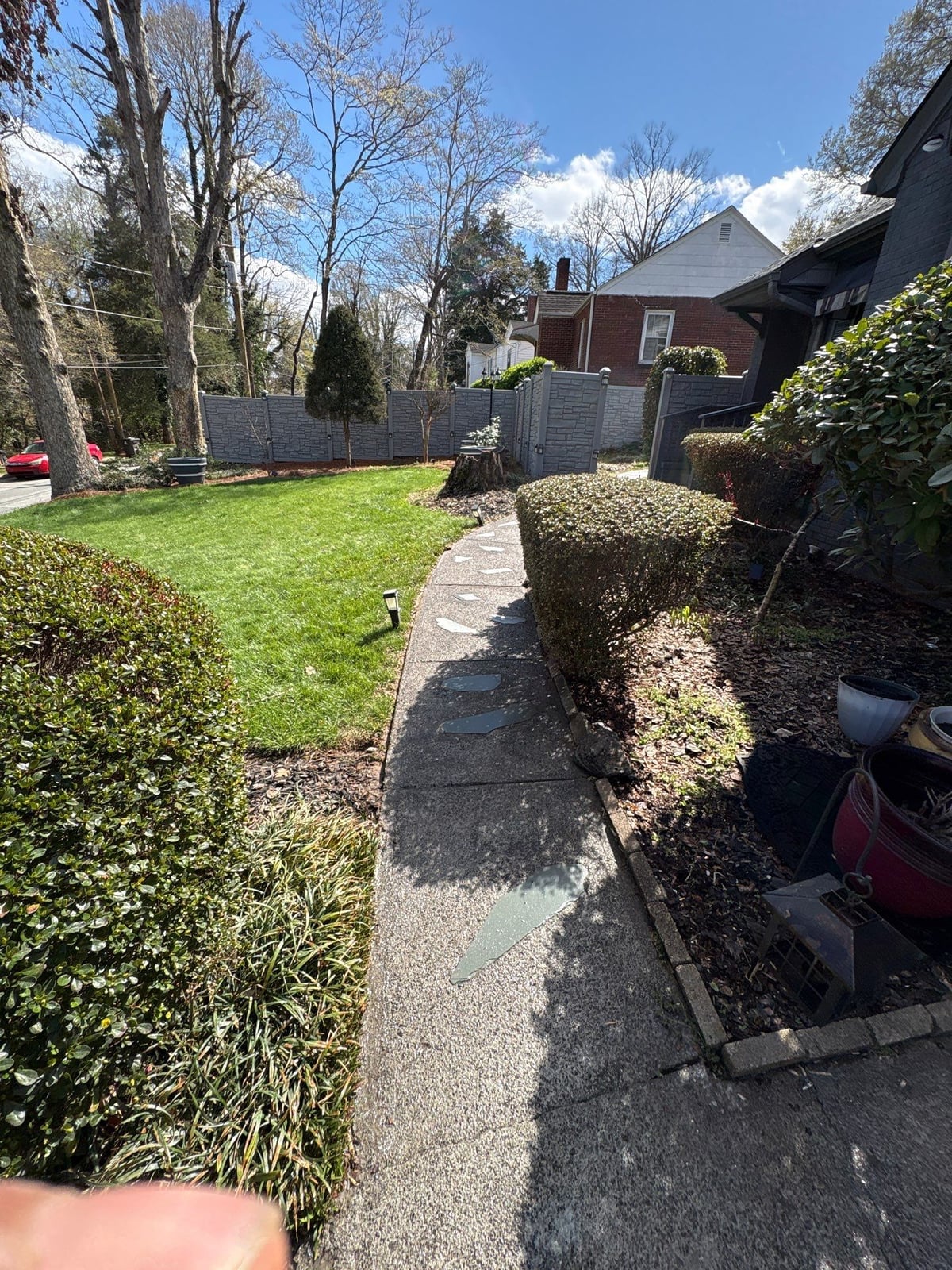 House washing and pressure washing front walkway and fence