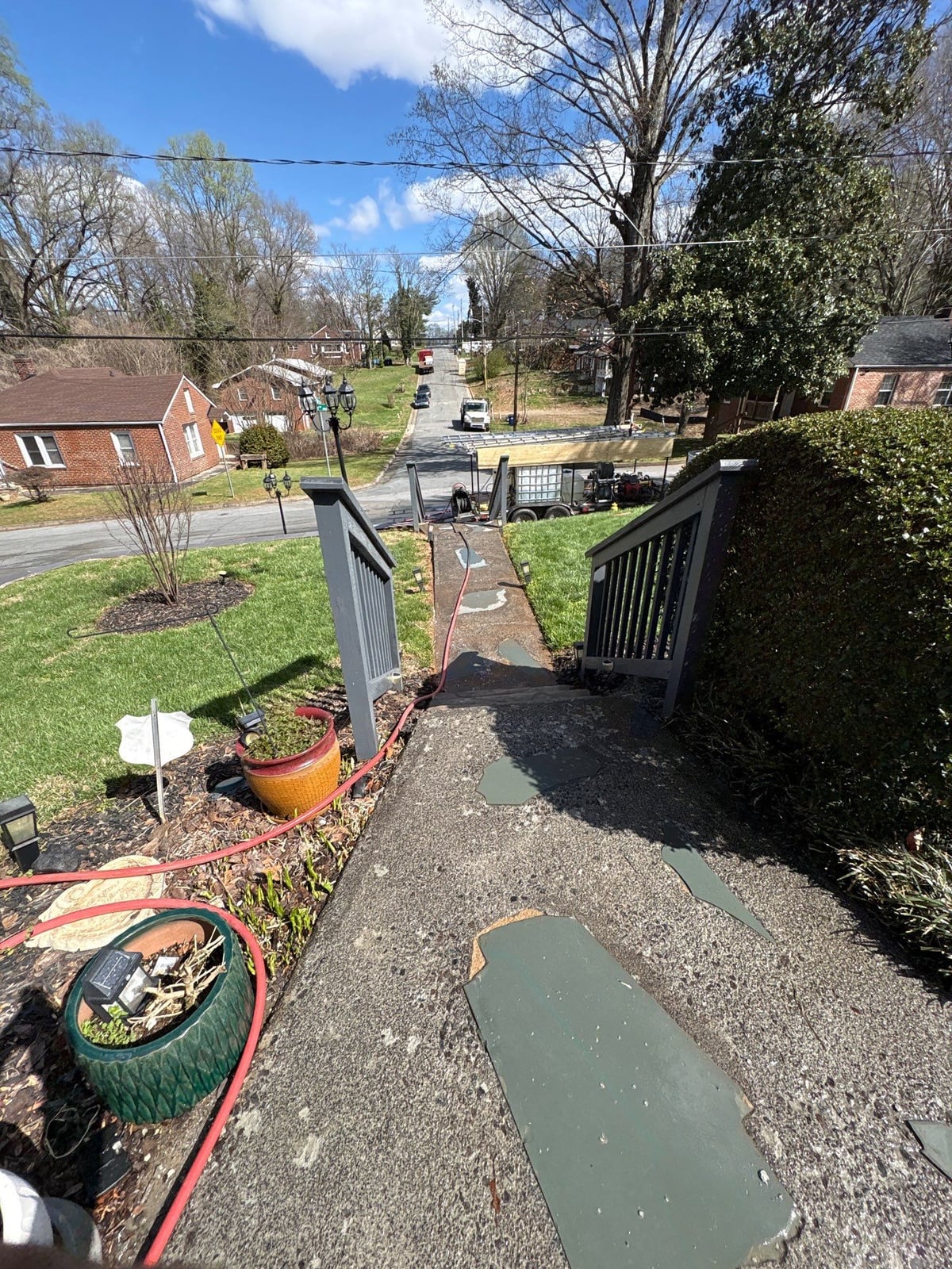 House washing and pressure washing front walkway and fence