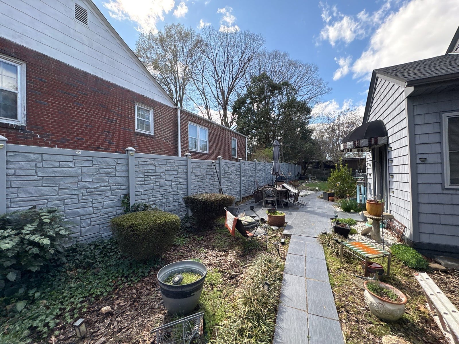 House washing and pressure washing front walkway and fence