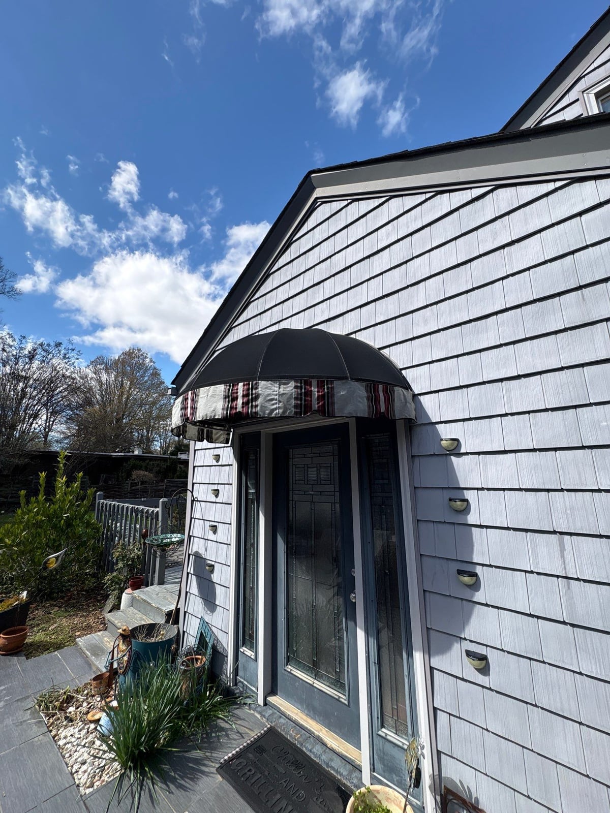 House washing and pressure washing front walkway and fence